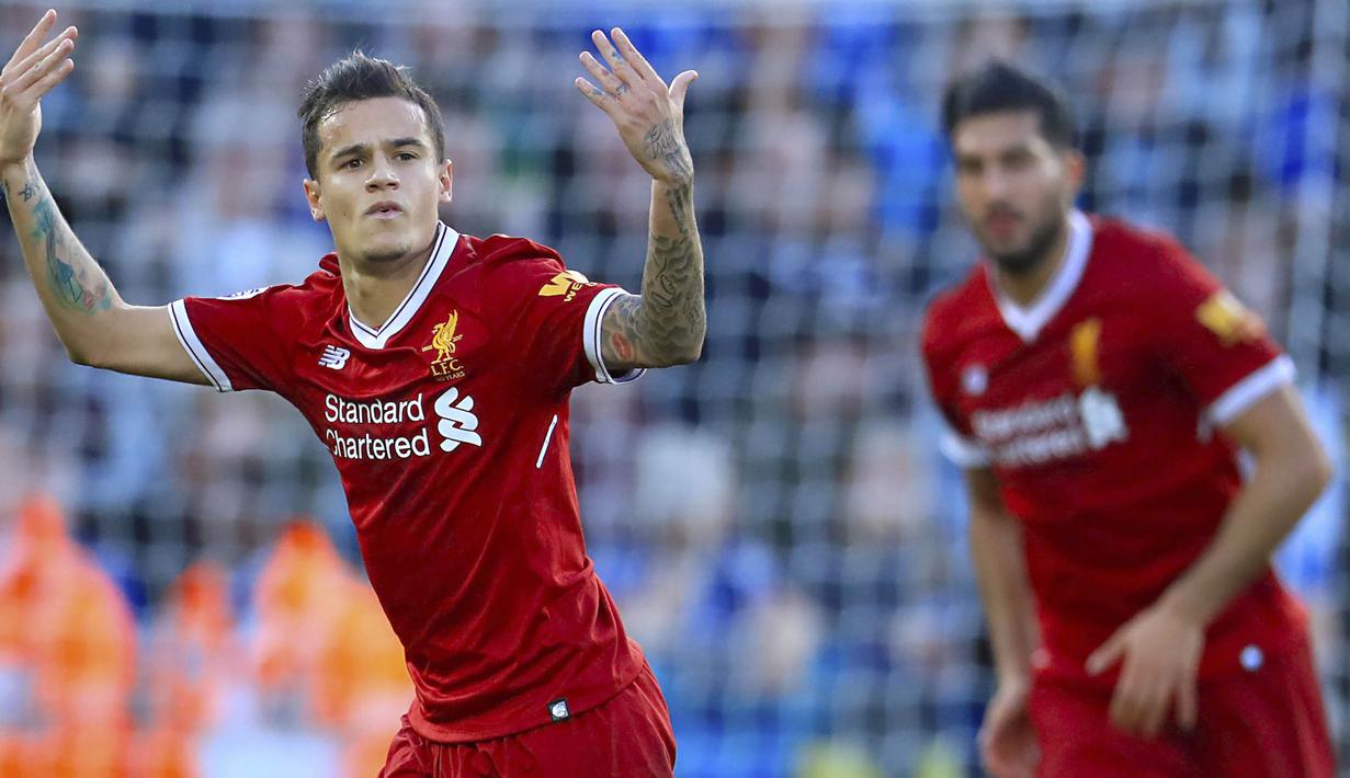Gelandang Liverpool, Philippe Coutinho, merayakan gol yang dicetaknya ke gawang Leicester pada laga Premier League di Stadion King Power, Leicester, Sabtu (23/9/2017). Leicester kalah 2-3 dari Liverpool. (AP/Mike Egerton)