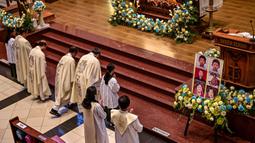 Misa peringatan ini menjadi bagian dari momen hening dan doa untuk para korban. (Juni KRISWANTO/AFP)