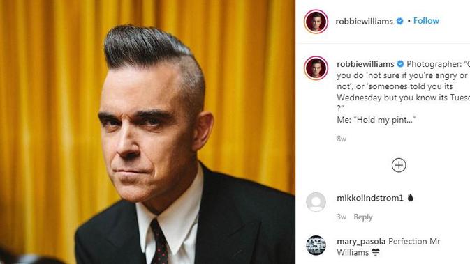 Robbie Williams makan sekali sehari untuk menurunkan berat badannya (Dok.Instagram/@robbiewilliams)