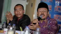 Juru bicara HTI, Ismail Yusanto memberikan pernyataannya saat menghadiri sebagai narasumber dalam diskusi polemik di Jakarta, Sabtu (15/7). Diskusi tersebut bertemakan "Cemas Perppu Ormas". (Liputan6.com/Faizal Fanani)