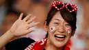 Suporter Jepang bersorak sebelum pertandingan antara Jepang dengan Rusia pada Rugby World Cup 2019 di Stadion Tokyo, Jepang, 20 September 2019. Rugby World Cup 2019 berlangsung pada 20 September  hingga 2 November. (Odd ANDERSEN/AFP)