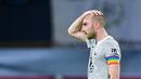 Kegagalan mempertahankan posisi di Bundesliga ini memicu kekecewaan mendalam dari para pemain di lapangan hijau termasuk Christian Eriksen. (AFP/Ina Fassbender)