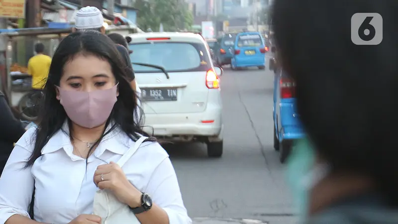 Kenakan Masker, Aktivitas Warga Depok Berjalan Normal