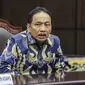 Ketua Mahkamah Konstitusi (MK) terpilih Suhartoyo memberikan keterangan pers usai rapat pleno di Gedung Mahkamah Konstitusi, Jakarta, Kamis (9/11/2023). (Liputan6.com/Angga Yuniar)