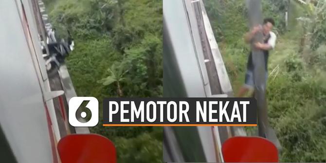 VIDEO: Viral Pemotor Nekat Terobos Jembatan Rel Kereta