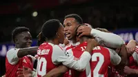 Selebrasi skuad&nbsp;Arsenal usai gol Gabriel Magalhaes dalam laga Liga Champions versus Atletico Madrid, Rabu (22/10/2025). (AP Photo/Alastair Grant)