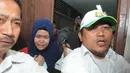 Pelaku pembunuhan Ade Sara, Assyifa Ramadhani saat meninggalkan ruang sidang PN Jakarta Pusat, Selasa (9/12/2014). (Liputan6.com/Herman Zakharia)