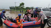 Ratusan rumah warga di Desa Cileungsi, Kecamatan Cileungsi, Kabupaten Bogor terendam banjir, Jumat (19/2/2021). (Liputan6.com/ Achmad Sudarno)