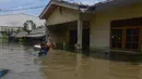 Plt Kepala Pelaksana BPBD Kota Tangerang Mahdiar mengatakan bahwa banjir dipicu oleh intensitas hujan tinggi serta meluapnya beberapa saluran air di wilayah padat penduduk. (merdeka.com/Arie Basuki)