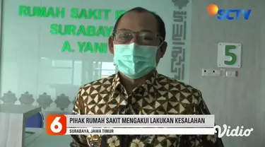 Rekaman video saat petugas berpakaian APD lengkap membawa jenazah pasien Covid-19 untuk dimakamkan di komplek pemakaman Kelurahan Pagesangan, Kota Surabaya. Namun usai menurunkan peti jenazah, petugas tiba-tiba membawa kembali peti jenazah ke dalam m...