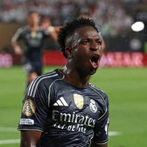 Pemain Real Madrid, Vinicius Jr, melakukan selebrasi seusai membobol gawang Salzburg pada lanjutan Piala Dunia Antarklub 2025, Jumat (27/6/2025) pagi. (FRANCK FIFE / AFP)