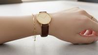 Model Gelang Emas 16 Karat untuk Dipakai Bersama Jam Tangan. Foto: Gemini
