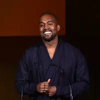 Kanye West bersama sang istri, Kim Kardashian terkenal sebagai pasangan yang romantis. Namun beberapa hari ini tersiar rumor keduanya akan segera bercerai, meski belum diketahui kebenarannya. (AFP/Bintang.com)