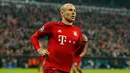 Gelandang Muenchen, Arjen Robben melakukan selebrasi usai mencetak gol kegawang Arsenal pada lanjutan Grup F liga champions di stadion Allianz Arena, Munich, Jerman (4/11). Muenchen menang atas Arsenal dengan skor 5-1. (Reuters/John Sibley) 