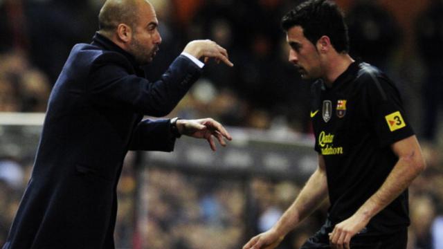 Josep Guardiola dan Sergio Busquets