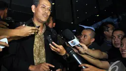 Anggito Abimanyu diperiksa sebagai saksi, Jakarta, Selasa (28/10/2014), dalam kasus korupsi penyelenggaraan ibadah haji di Kementerian Agama Tahun 2012-2013 dengan tersangka Suryadharma Ali. (Liputan6.com/Miftahul Hayat)