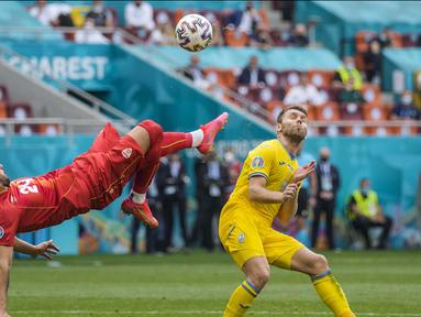 Ukraina berhasil memetik tiga poin pertama mereka di Euro 2020. Berhadapan dengan Makedonia Utara, Ukraina berhasil menang dengan skor 2-1 di pertandingan matchday kedua Grup C Euro 2020. (Foto: AP//Pool/Vadim Ghirda)