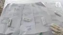 Hasil rapid test wisatawan di kawasan Gadog, Bogor, Jawa Barat, Kamis (29/10/2020. Pemkab Bogor mewajibkan wisatawan yang mengunjungi kawasan Puncak dan sekitarnya untuk mengikuti rapid test untuk mencegah penyebaran COVID-19. (merdeka.com/Arie Basuki)