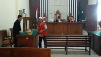 Aulia Rakhman saat menjalani sidang dengan agenda mendengar tuntutan Jaksa di PN Tanjung Karang, Bandar Lampung.  Foto : (Istimewa).