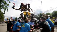 Ritual menjelang Nyepi ini untuk mengusi roh jahat sekaligus sebagai penyucian diri umat Hindu. (Liputan6.com/Dio Pratama).