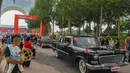 Iring-iringan kendaraan memulai tur keliling kota sebagai bagian dari acara pameran produk dan budaya Hongqi, merek otomotif ikonis China, yang digelar di Changchun, Provinsi Jilin, China timur laut, pada 28 Juli 2020. (Xinhua/Zhang Nan)