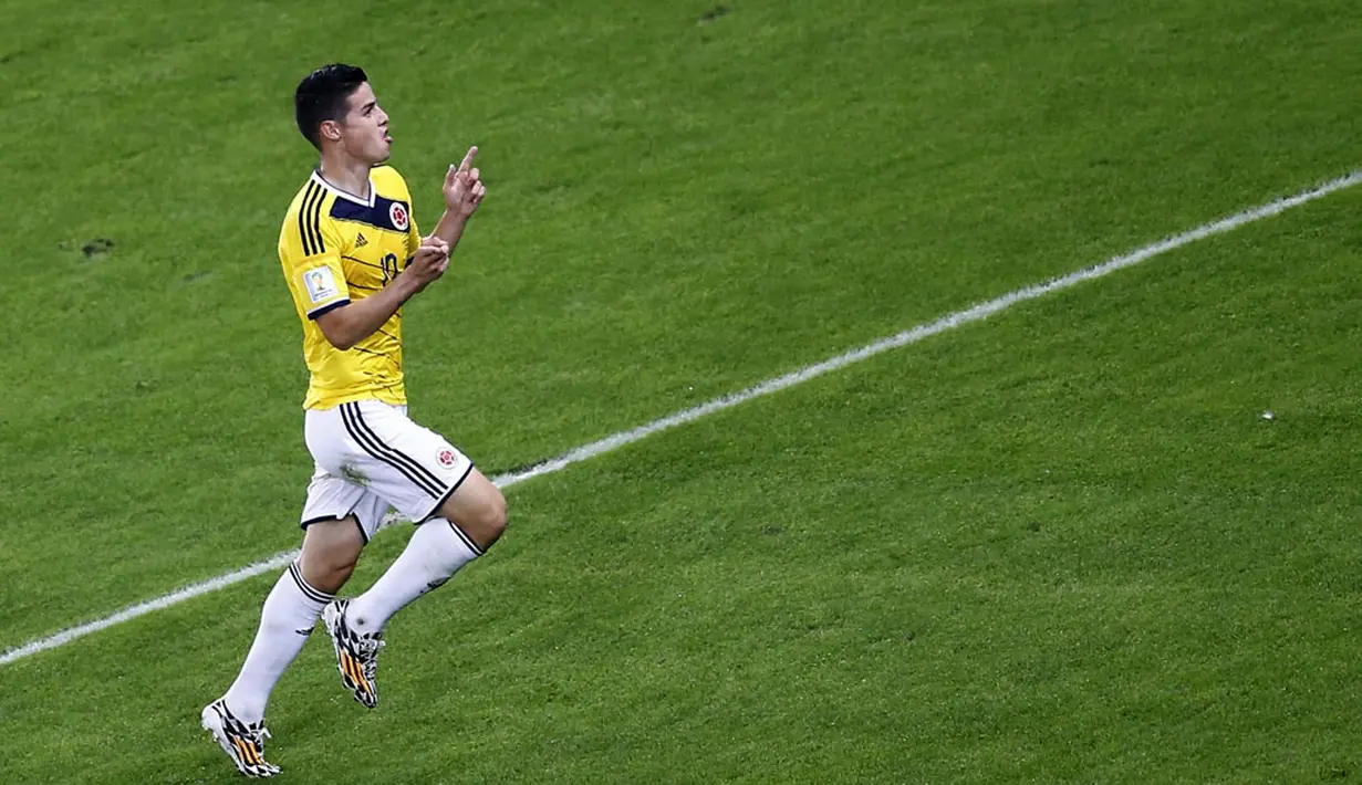 Salah satu gaya selebrasi pemain tengah Kolombia, James Rodriguez, usai menjebol gawang Uruguay di laga 16 besar Piala Dunia 2014 di Stadion Maracana, Rio de Janeiro, (29/6/2014). (REUTERS/Ricardo Moraes)  
