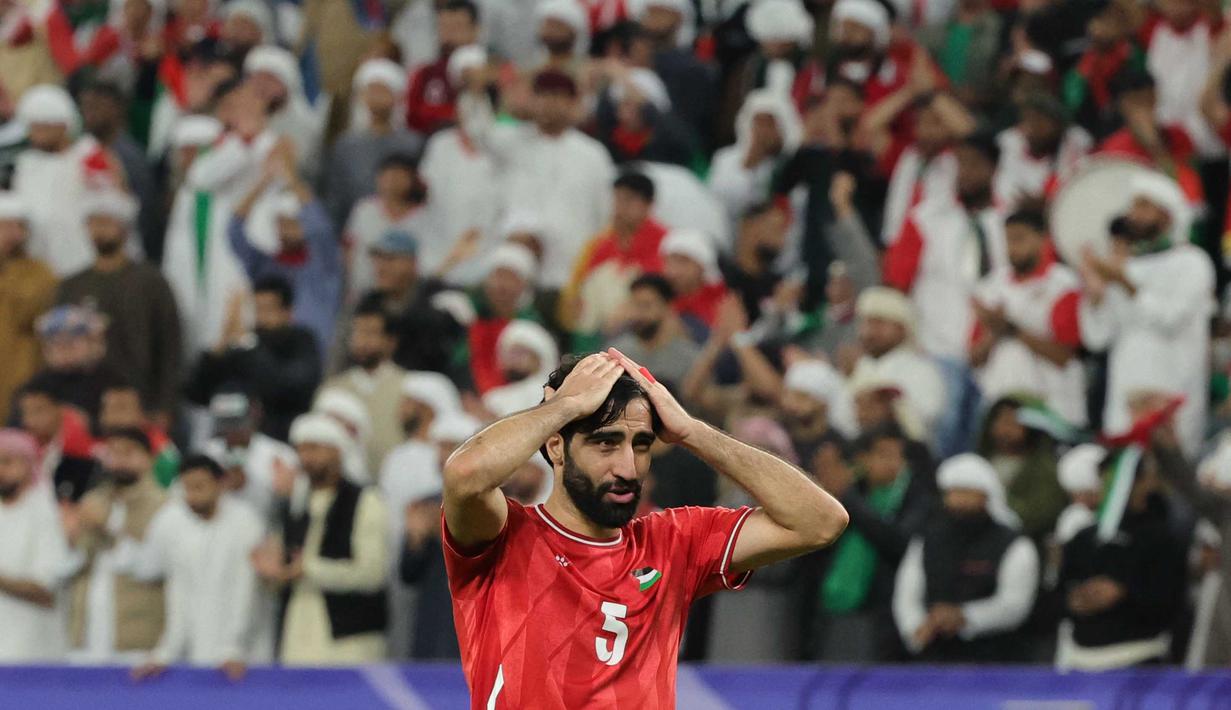 Dengan hasil ini Palestina berada di posisi ketiga, sementara Uni Emirat Arab menduduki puncak klasemen. (Giuseppe CACACE/AFP)