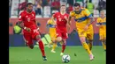Tigres UANL melalui pemain andalannya yakni Andre-Pierre Gignac berusaha menguasi pertandingan. (Foto: AFP)