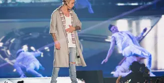 Baru-baru ini Justin Bieber kembali mengecewakan para penggemarnya. Bukan soal membuat ulah atau bersikap tidak sopan, melainkan soal pembatalan tur konsernya yang selama ini sedang dijalaninya.  (AFP/Mat Hayward)