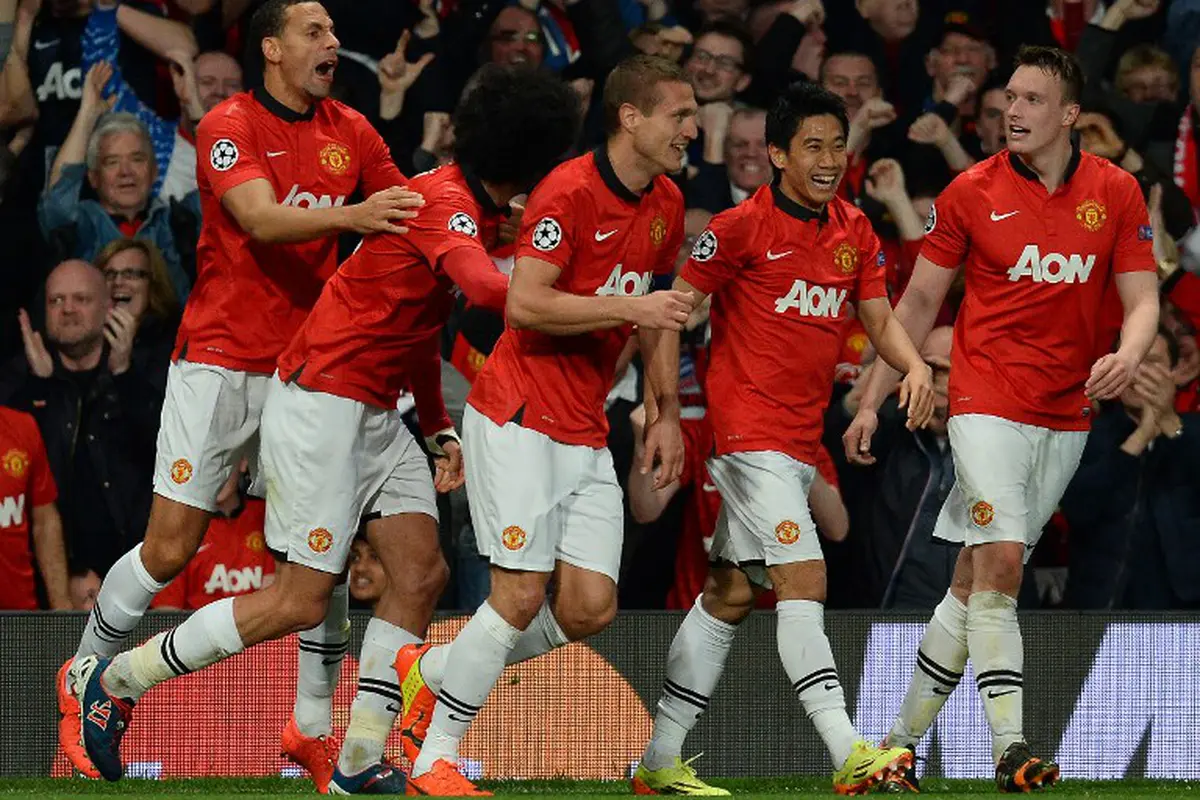 Selebrasi gol Nemanja Vidic (ANDREW YATES / AFP)