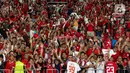 Suporter tim Garuda menyambut kemenangan timnas Indonesia dengan gegap gempita. (Liputan6.com/Herman Zakharia)