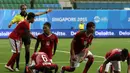 Sujud syukur menyambut gol yang dicetak Muchlis Hadi Ning Syaifulloh ke gawang Kamboja U-23. (Bola.com/Arief Bagus)