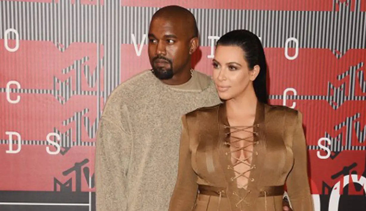 Pasangan Kim Kardashian dan Kanye West sedang  berusaha menjaga hubungan pernikahan mereka. Kanyepun dikabarkan berjanji untuk menjadi suami dan ayah yang lebih baik untuk istri dan anaknya. (AFP/Bintang.com)