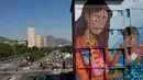 Mural berjudul 'Contos' yang dilukis Luna Buschinelli (19), di dinding gedung sekolah Rio de Janeiro, Brasil, (19/6). Karya berukuran 2.500 meter persegi itu memecahkan rekor dunia sebagai mural terbesar yang dibuat oleh wanita. (AP/Silvia Izquierdo)