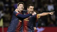 1. Xavi Hernandez - Xavi merupakan salah sosok sentral di Barcelona ketika Messi datang. Mereka meraih berbagai prestasi hebat bersama-sama. Jika Xavi memberikan umpan, Messi dengan mudah menjebol gawang lawan.  Kerja sama di antaranya keduanya sangat simpel, tapi mematikan. (AFP/Cesar Manso)
