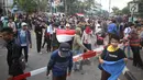 Pelajar berkumpul saat berunjuk rasa di Palmerah, Jakarta, Rabu (25/9/2019). Pihak kepolisian menembakan gas air mata untuk memukul mundur pelajar. (Liputan6.com/Angga Yuniar)