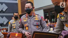 Kepala Kepolisian Negara Republik Indonesia (Kapolri) Jenderal Pol. Listyo Sigit Prabowo saat menghadiri rapat dengar pendapat (RDP) dengan DPR RI di Jakarta, Rabu (24/8/2022). Rapat tersebut membahas kasus penembakan Brigadir J di rumah dinas Irjen Pol. Ferdy Sambo. (Liputan6.com/Angga Yuniar)