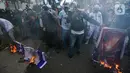 Dalam demonstrasi ini, pemgunjuk rasa menuntut agar Palestina dimerdekakan dari penjajahan yang dilakukan Israel. (Liputan6.com/Faizal Fanani)