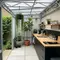 Dapur Kecil Semi Outdoor dengan Rangka Baja Ringan dan Tanaman Hias (Gemini AI)