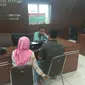 Korban pencabulan tetangganya melaporkan diri ke SKPT Polresta Palembang (Liputan6.com / Nefri Inge)