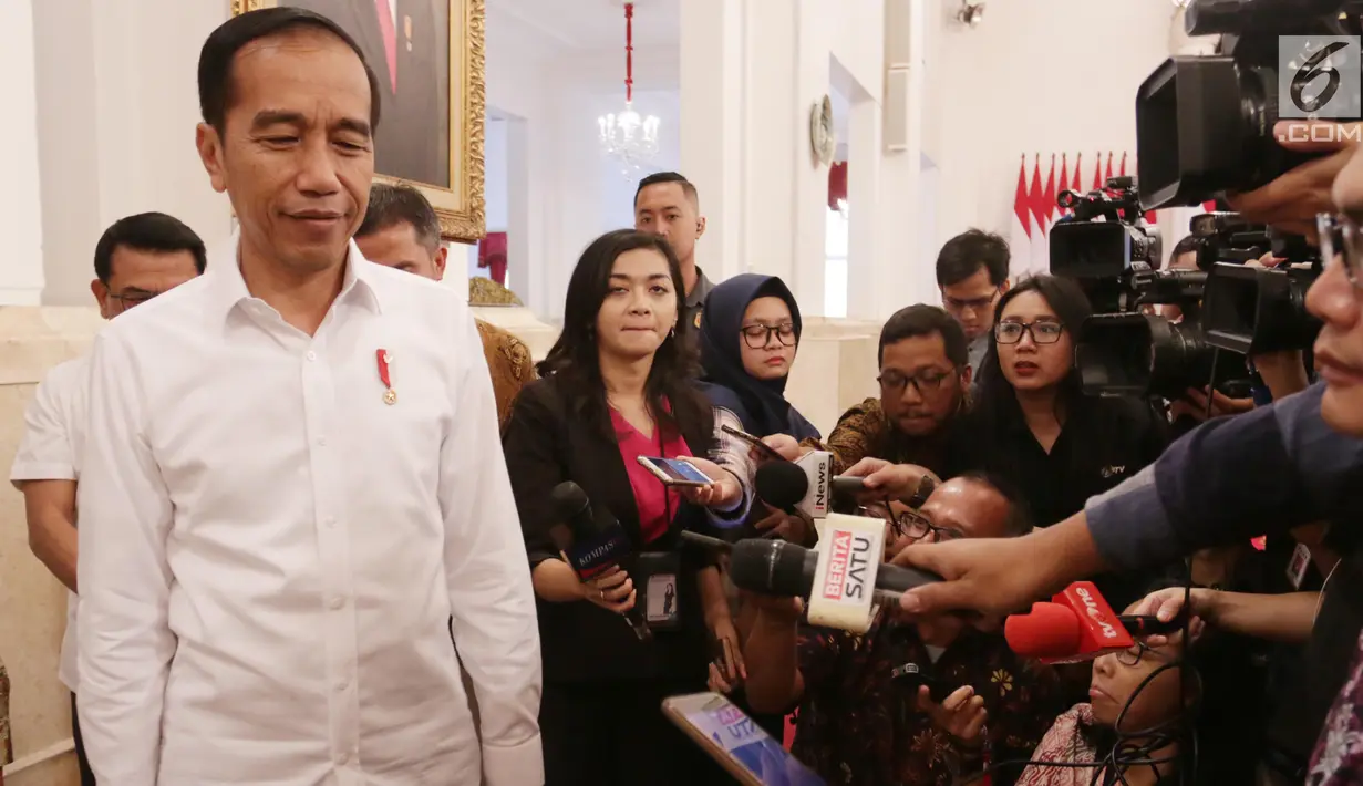 Presiden Joko Widodo usai memberikan keterangan terkait revisi UU KPK di Istana Negara, Jakarta, Jumat (13/9/2019). Jokowi menyatakan mendukung sejumlah poin dalam draf revisi UU KPK diantaranya kewenangan menerbitkan SP3. (Liputan6.com/HO/Kurniawan)
