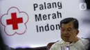 Ketua Umum PMI, Jusuf Kalla memberikan keterangan usai tanda tangan simbolis sejuta masker untuk tangkal Virus Corona COVID-19 di Jakarta, Selasa (25/2/2020). Gerakan pengadaan satu juta boks masker dan sabun antiseptik untuk persiapan apabila virus masuk ke Indonesia. (Liputan6.com/Faizal Fanani)