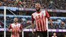 Ekspresi pemain Southampton, Nathan Redmond, setelah mencetak gol ke gawang Manchester City dalam laga Premier League di Stadion Etihad, Manchester, Minggu (23/10/2016). (AFP/Oli Scarff)