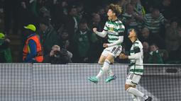 Striker Glasgow Celtic asal Jepang, Kyogo Furuhashi telah mencetak 2 gol dari tiga laga di Liga Champions musim 2023/2024. Kedua gol tersebut dicetaknya masing-masing pada matchday kedua Grup E ke gawang Lazio (4/10/2023) dalam laga yang berakhir 2-1 untuk kemenangan Lazio dan ke gawang Atletico Madrid pada matchday ketiga (25/10/2023) dalam laga yang berakhir imbang 2-2. (AFP/Andy Buchanan)