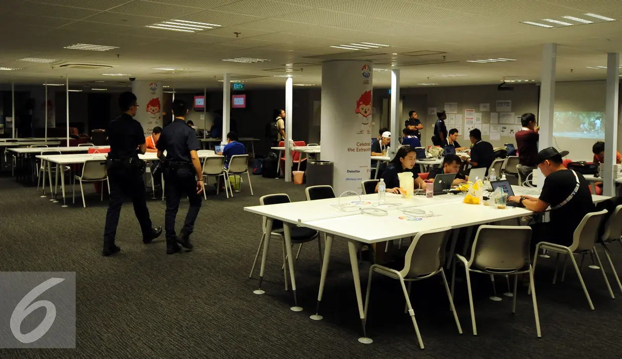Jelang dimulainya perhelatan Sea Games 2015 Singapura, pihak penyelenggara terus berbenah. Tampak, suasana Main Press Centre (MPC) yang terletak di Gate 18 National Stadium Singapura, Senin (1/6/2015). (Liputan6.com/Helmi Fithriansyah)