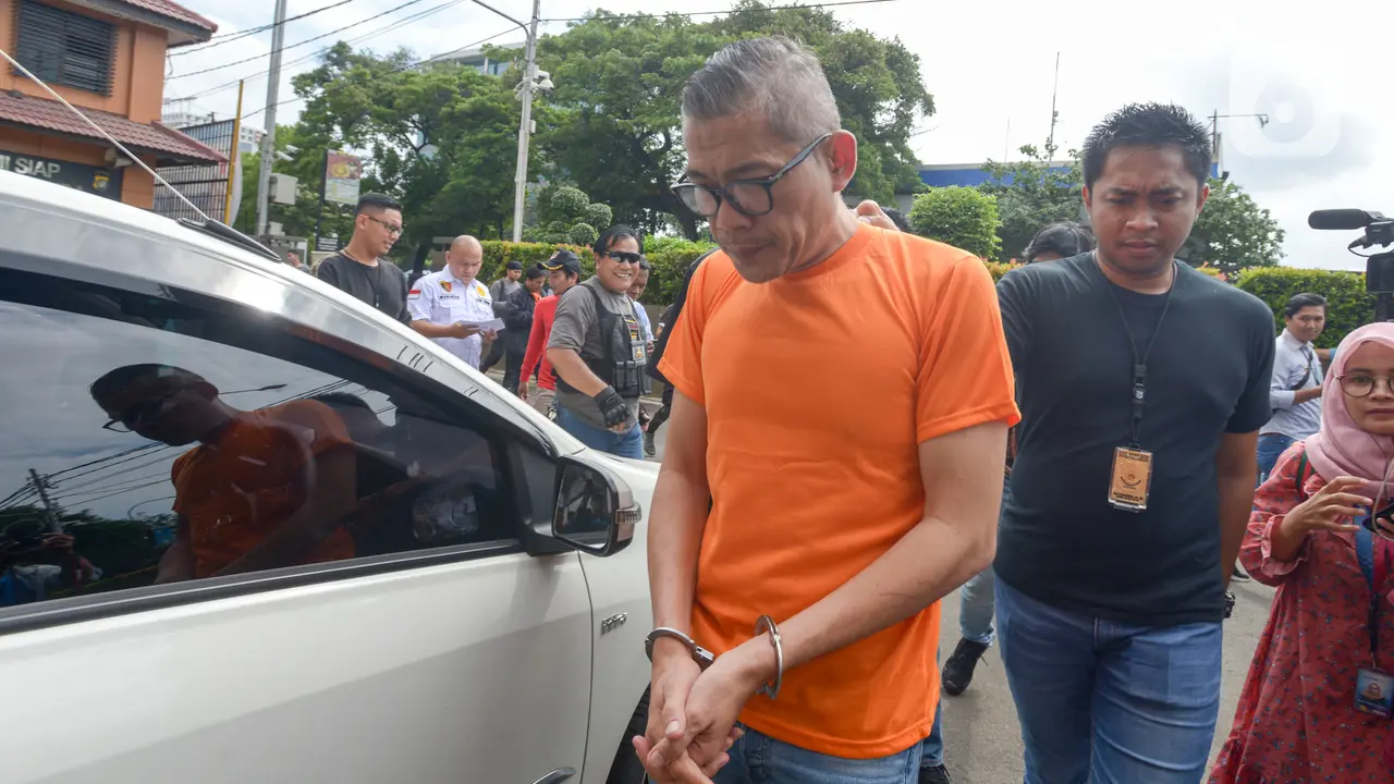 Dibekuk, Pengemudi yang Cekik Polantas di Tol Angke Tertunduk