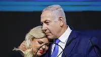 Perdana Menteri Israel Benjamin Netanyahu dan Istri Sara Netanyahu. (Dok. AFP/Thomas Coex)