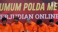 Dari 24 tersangka yang ditahan dalam pengungkapan kasus judi online, sembilan diantaranya merupakan pegawai serta staf Komdigi. (Liputan6.com/Herman Zakharia)
