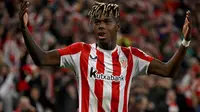 Pemain depan Athletic Bilbao asal Spanyol #10, Nico Williams, merayakan gol pertama timnya dalam pertandingan leg kedua babak 16 besar Liga Europa UEFA antara Athletic Club Bilbao dan AS Roma di stadion San Mames di Bilbao, pada 13 Maret 2025. (ANDER GILLENEA/AFP)