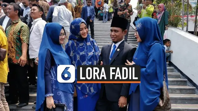 Sosok anggota DPR dari fraksi Nasdem Lora Fadil mencuri perhatian warganet. Selain tertidur saat sidang pelantikan, Fadil juga datang bersama ketiga istrinya ke gedung DPR/MPR.
